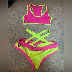 Bad Kitty Pole outfit; pink top and pink scrunch bottoms